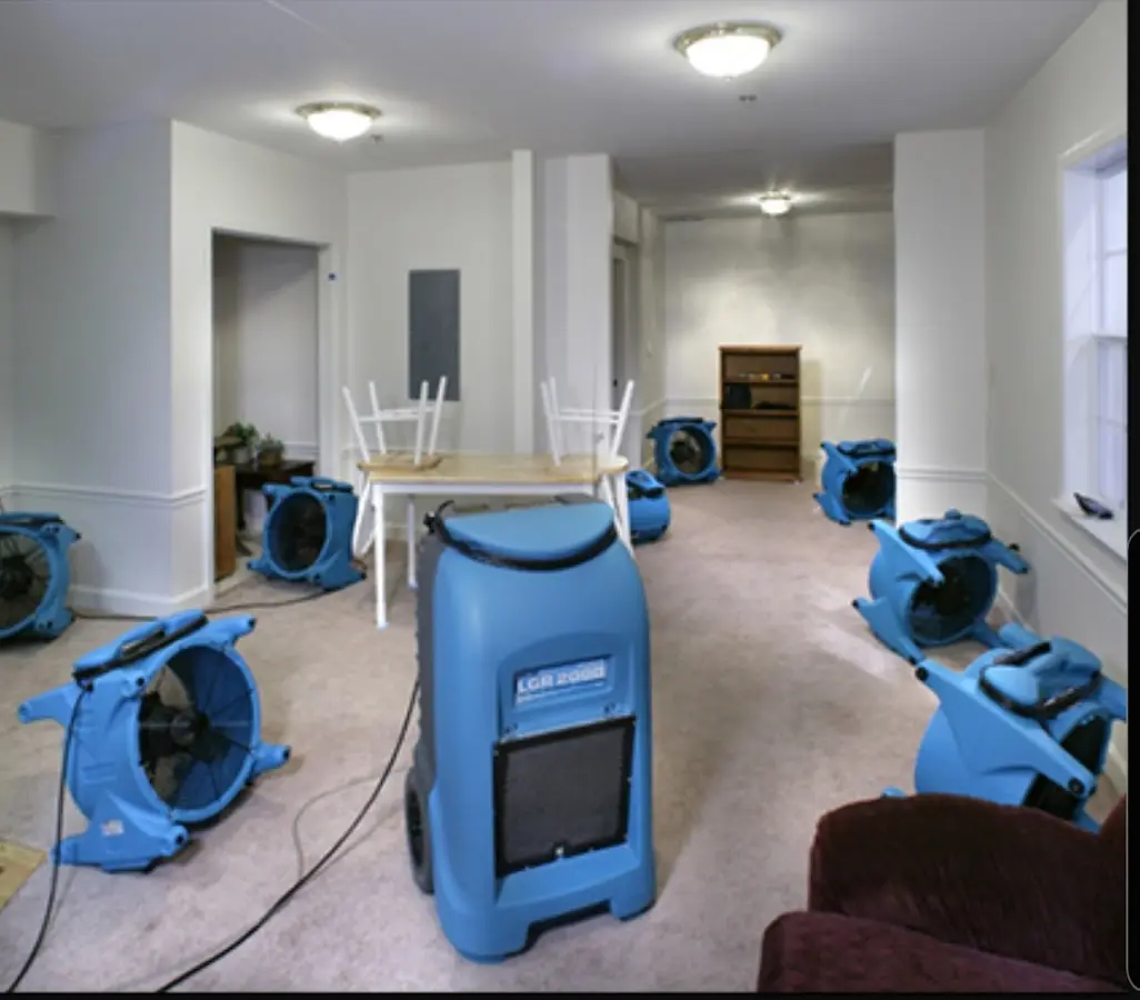 Air movers and dehumidifier setup for Water Extraction & Removal in Offutt AFB