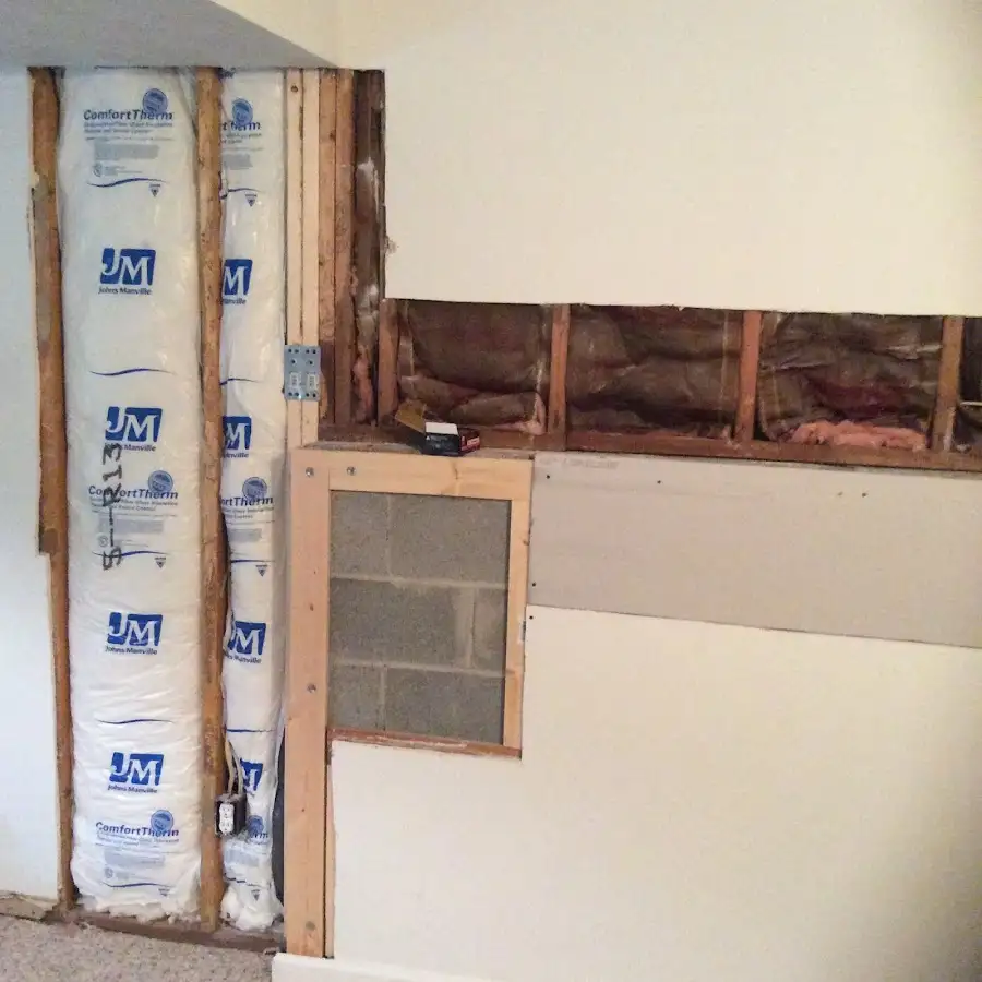Wall insulation replacement during Basement Flood Cleanup in Offutt AFB
